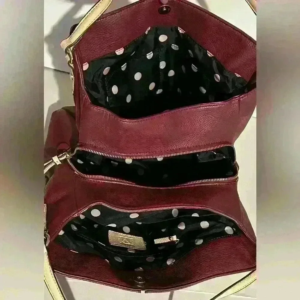 An Anne Klein 3 compartment lrg. Hobo bag.